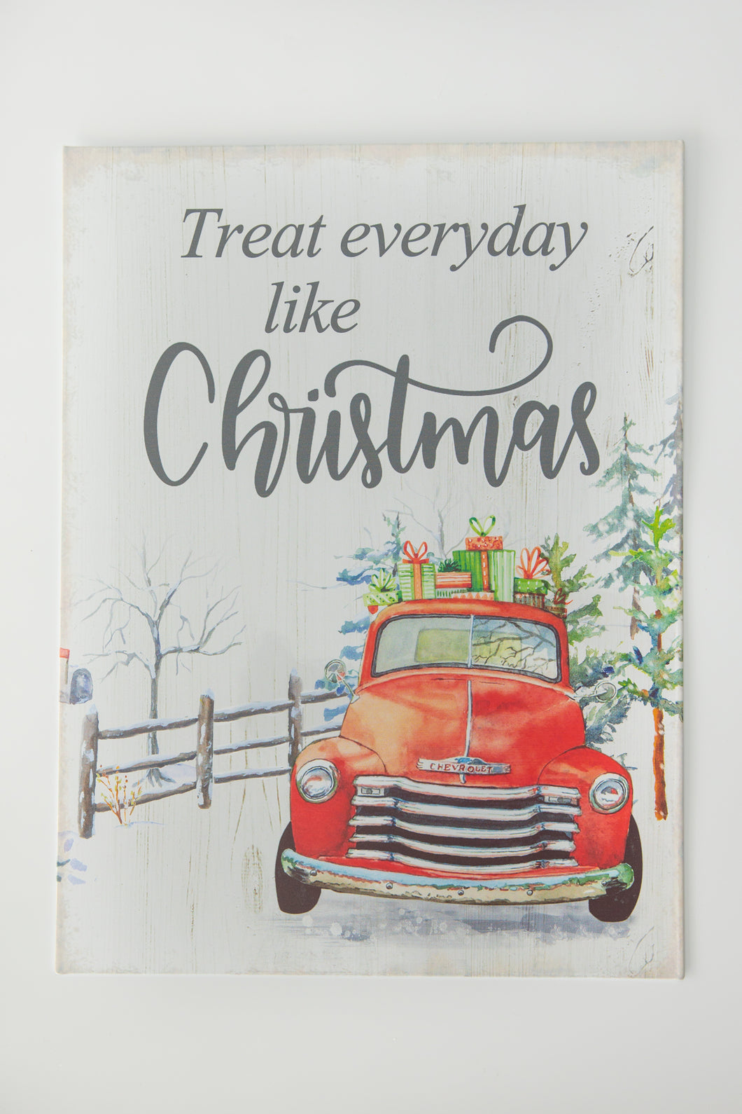 “Treat every day like Christmas” white metal sign