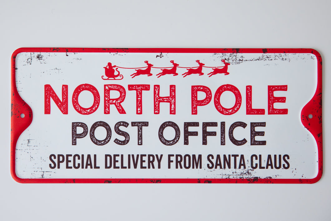 “North Pole Post Office” white metal sign